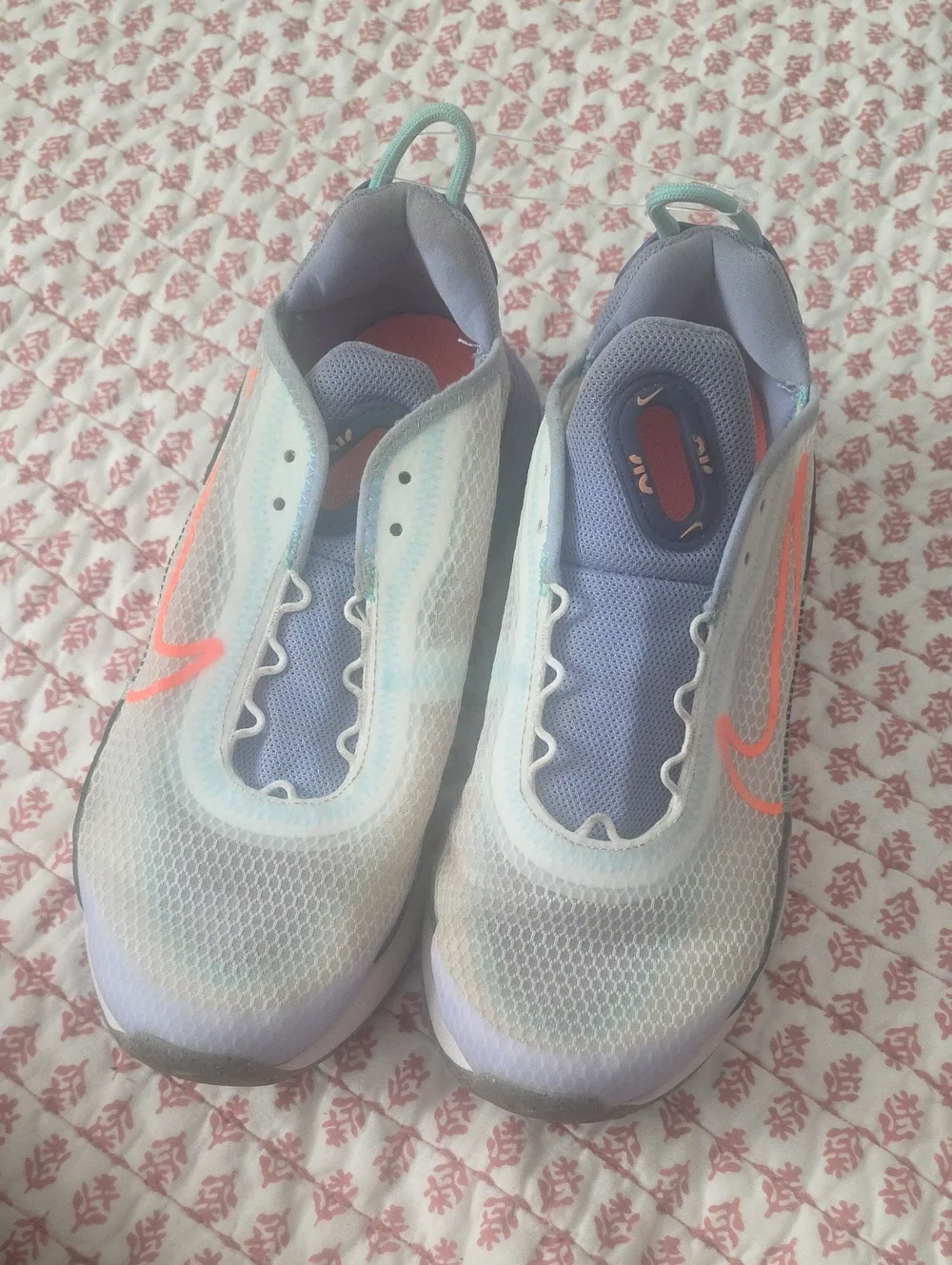 Nike Women’s Light Blue Slip-On Running Shoes with Coral Swoosh( No Strings)